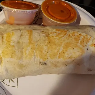 Burrito with some hot sauce