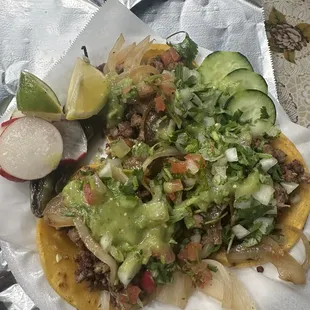 Carne asada tacos with grilled onions