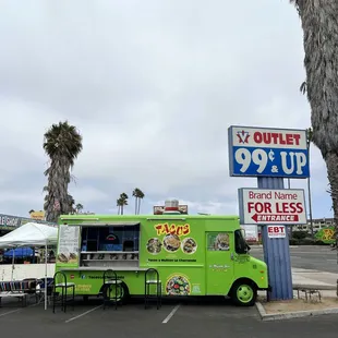 a taco truck parked in a parking lot