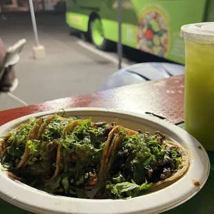 4 tacos (carnitas, chorizo, al pastor, asada) + pineapple spinach agua fresca DELISH!!