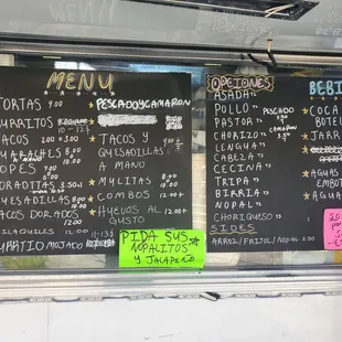 a menu on a food truck