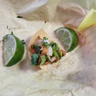 Al Pastor, 2 hot sauces, cilantro, and onion. I would have posted the tacos, but the nibble turned into a smash!  A 10 out of 10!