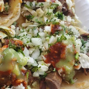 a plate of tacos on a table