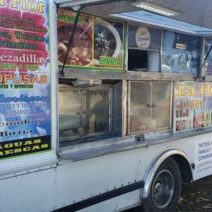 a food truck parked on the side of the road