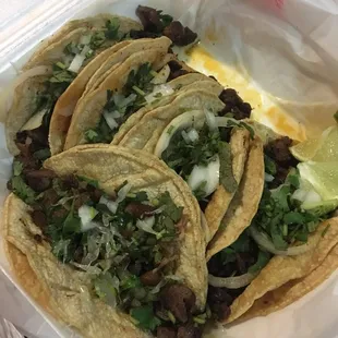 6 tacos, 2 al pastor, 2 asada, 2 compechano.