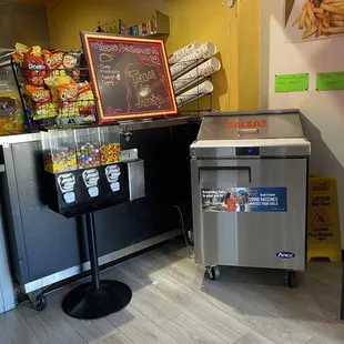 Toppings bar, chips, menus and candies