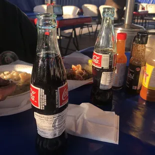 They serve Mexican Coke Horchata, orange, crush, and other flavors.