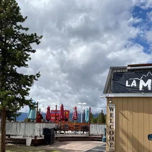 a taco stand with a sign that says tacos mina