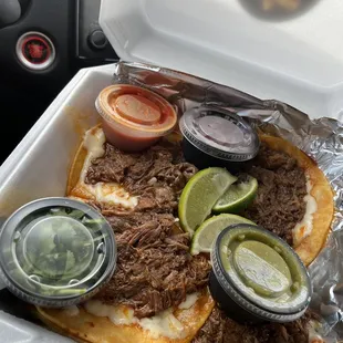 a taco in a styrofoam container