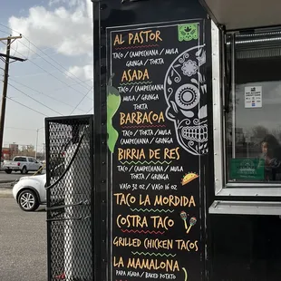 a menu on a food truck
