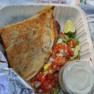 Carne asada quesadilla w/ pico de gallo. Also served with sour cream and guacamole. Nice! :^')