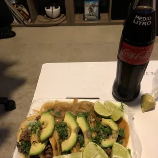 Delicious Tacos de Asada. Coke sold at gas station next door.