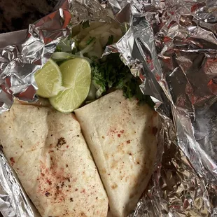 a tortilla wrapped in aluminum foil