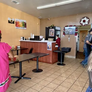 a group of people in a restaurant