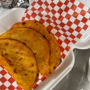 a close up of a taco in a styrofoam container
