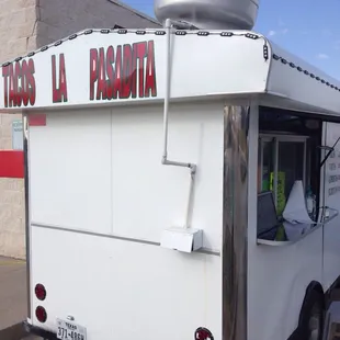 a taco truck parked in a parking lot