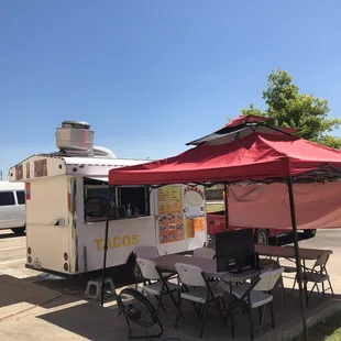 a taco truck parked in a parking lot