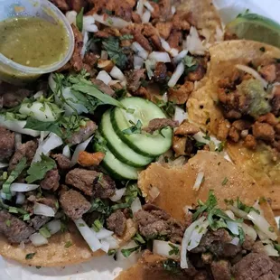 Asada and pastor tacos.  Lacked seasoning.