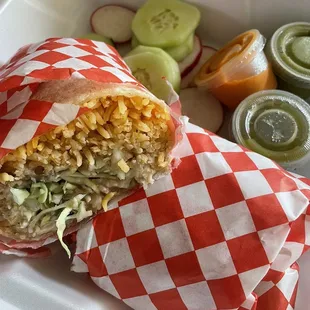 Burrito with rice, refried beans, cabbage, cilantro, and onions