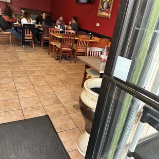 Inside, across from where the food truck is....