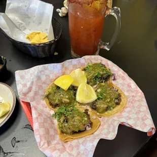 Tacos of carne asada and cabeza