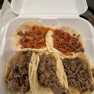 three tacoss in a styrofoam container