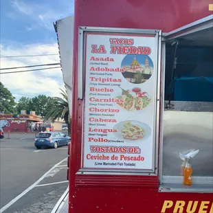 a taco truck in a parking lot