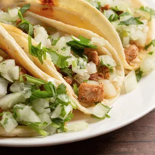 Taco de Pollo Asado, marinated Chicken grilled over mesquite wood.