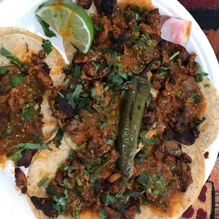 Al pastor tacos w/ no ceballos (that&apos;s onions in Spanish)