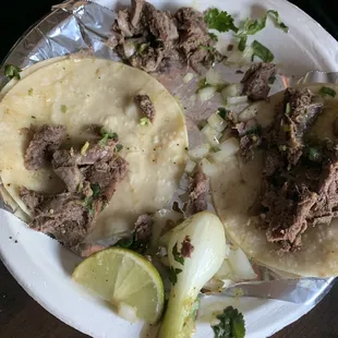 Was topped off with cilantro and onion when asked for plain tacos