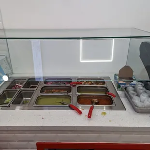 Salsa/toppings bar.