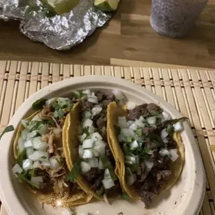 a plate of tacos and a cup of coffee