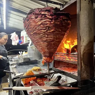 a man preparing food in a kitchen