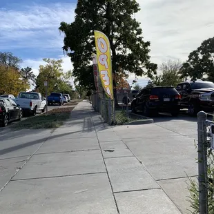 a tacos la tapatia sign on the sidewalk