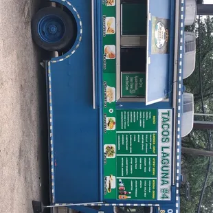 a food truck parked on the side of the road