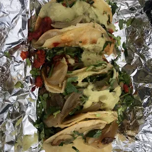 2 Barbacoa, 1Carne Asada, and 2 Al Pastor Tacos. Absolutely delicious!