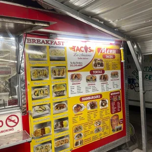 a food truck with a menu