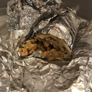 Super burrito is now $8. Comes with beans, rice, cheese, and choice of meat only. They have salsa on the side. Pretty good.