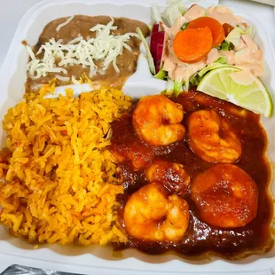 a meal in a styrofoam container