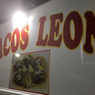 tacos leon on the side of the truck