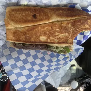 a sub sandwich in a wrapper