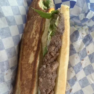 a tacos lira sandwich in a basket