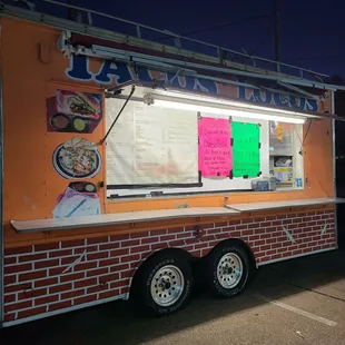 a food truck parked in a parking lot