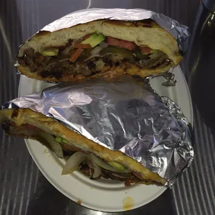 Torta de asada,chorizo y jamón deliciosa