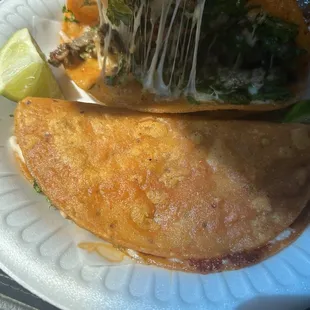 Crane asada cheesy tacos