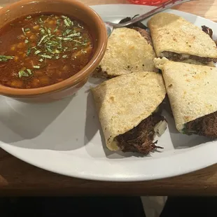 Birria tacos with consome&apos;