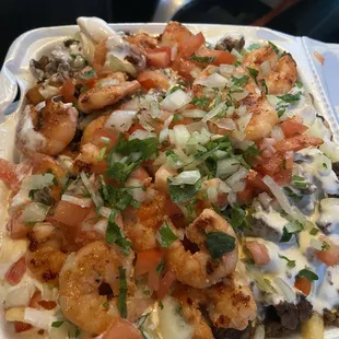 Overflowing with steak fries goodness.