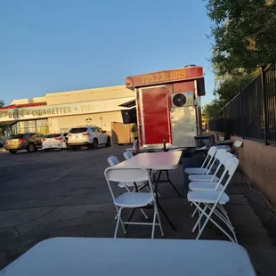 Table and chairs sitting outside