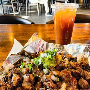 Prime Papa Loka, Ribeye Carne Asada topped with Aguacate  with extra cilantro y cebolla on top!