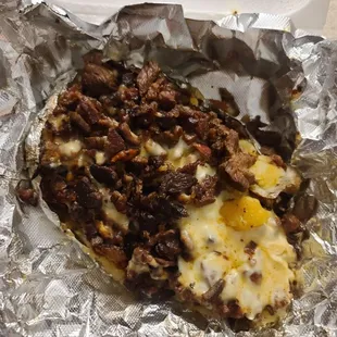 Carne Asada Baked Potato comes piping hot and fresh